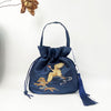 Embroidered Drawstring Bucket Bag with Tassel, Floral and Animal Motifs
