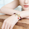 Year of the Horse Garnet Bracelet with Gold-Tone Horse Charm