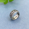 Silver tone copper ring with Om Mani Padme Hum engraving