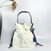 Embroidered Drawstring Bucket Bag with Tassel, Floral and Animal Motifs