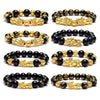 Gold-tone Pixiu charm on a black obsidian bead bracelet