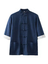 Front view of a navy blue men's Tang suit shirt with white cuffs