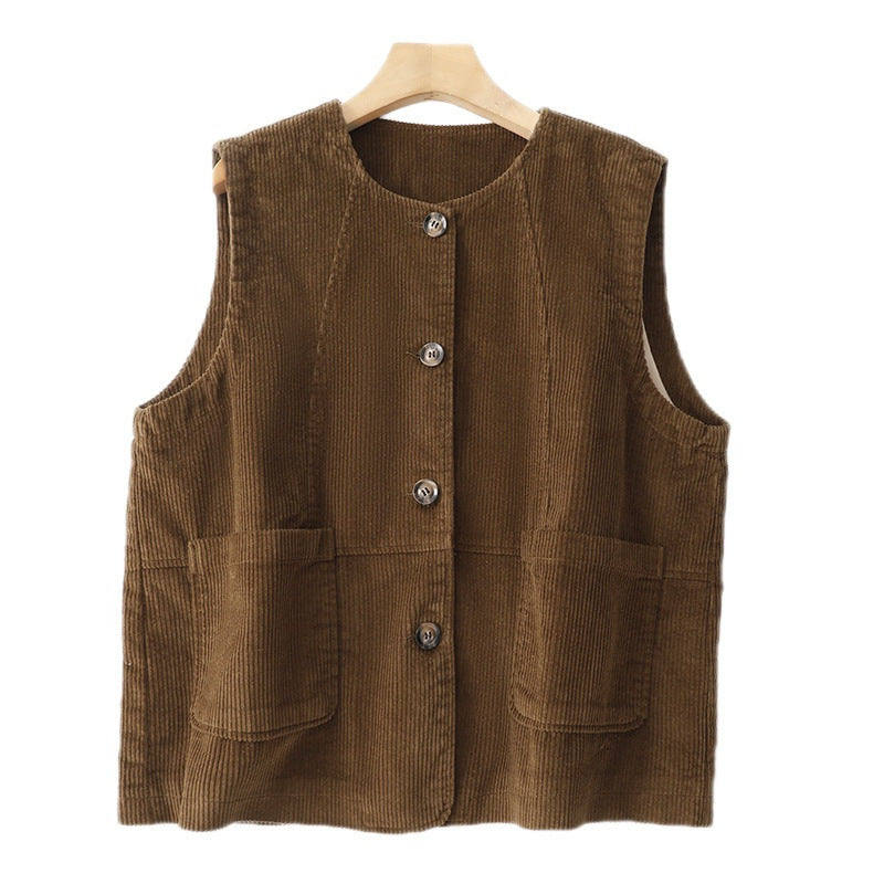 Three corduroy vests in brown, black, and green stacked on a white background