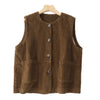 Three corduroy vests in brown, black, and green stacked on a white background