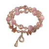 Double layer pink cat's eye beaded bracelet with gold-tone gourd pendant