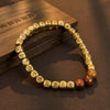 Copper Mantra Bracelet with Cinnabar Beads
