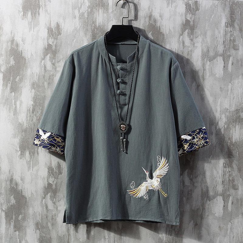 Green men's half-sleeve shirt with crane embroidery and frog buttons