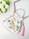 Embroidered Drawstring Bucket Bag with Tassel, Floral and Animal Motifs