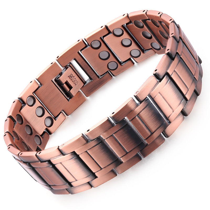 Close up of a vintage red copper titanium steel magnetic bracelet bangle