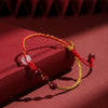 Red and Yellow Braided Cord Bracelet