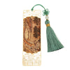 Gold-tone metal bookmark with landscape painting and green tassel