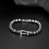 Copper Horseshoe Charm Bracelet with Carved Beads