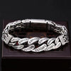 Silver-tone copper bracelet with twisted links engraved with mantras
