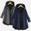 Front view of a blue women's hooded coat with a textured weave pattern