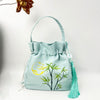 Embroidered Drawstring Bucket Bag with Tassel, Floral and Animal Motifs