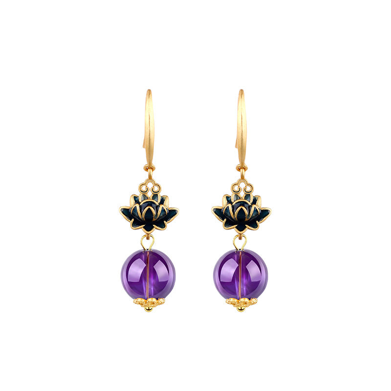 Gold-tone earrings with blue enamel lotus charms and purple amethyst drops