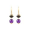 Gold-tone earrings with blue enamel lotus charms and purple amethyst drops