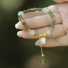 Handmade Red String Bracelet with Love Knot and Flower Charm