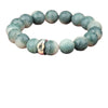 Green bodhi seed bracelet with engraved mantra bead