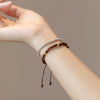 Adjustable Golden Silk Sandalwood Bracelet with Gold-tone Beads