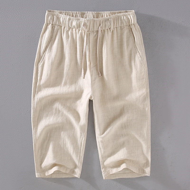 Front view of beige men's linen cropped pants with drawstring waist