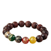 Red sandalwood bracelet with five colorful engraved beads representing wealth gods