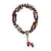 Tibetan style agate dzi bead bracelet with bamboo shaped beads and gold charm
