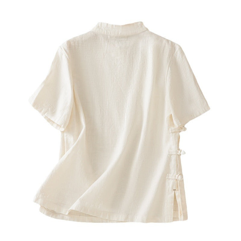 Back view of a white women's cotton linen short sleeve shirt with side frog buttons