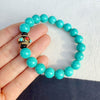 Turquoise Bracelet with Tibetan Style Beads and Charm