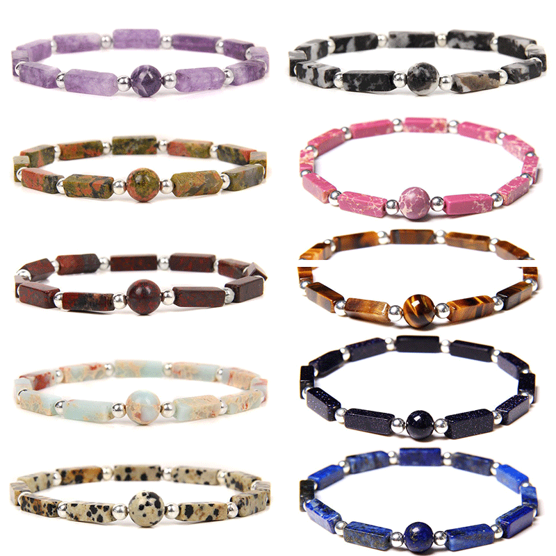 A collection of natural crystal bracelets with geometric bar beads and silver spacers on a white background