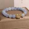 Blue Crystal Butterfly Bracelet with Gold-Tone Accents