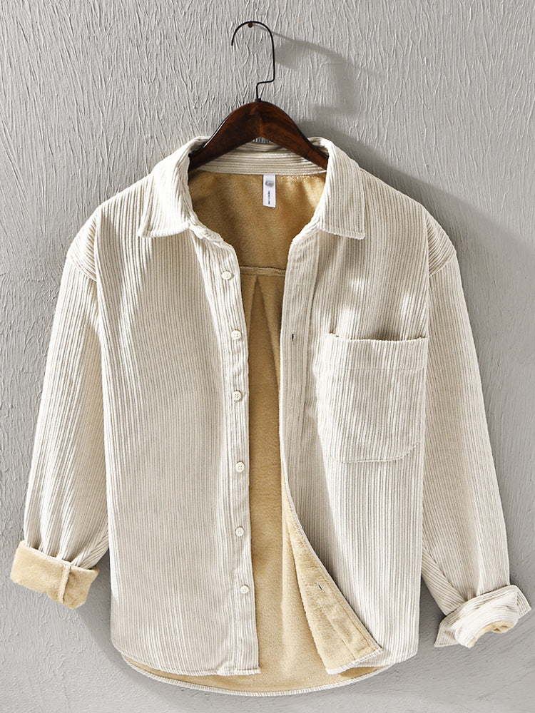 Men's long sleeve corduroy shirt in khaki color hanging on a hanger