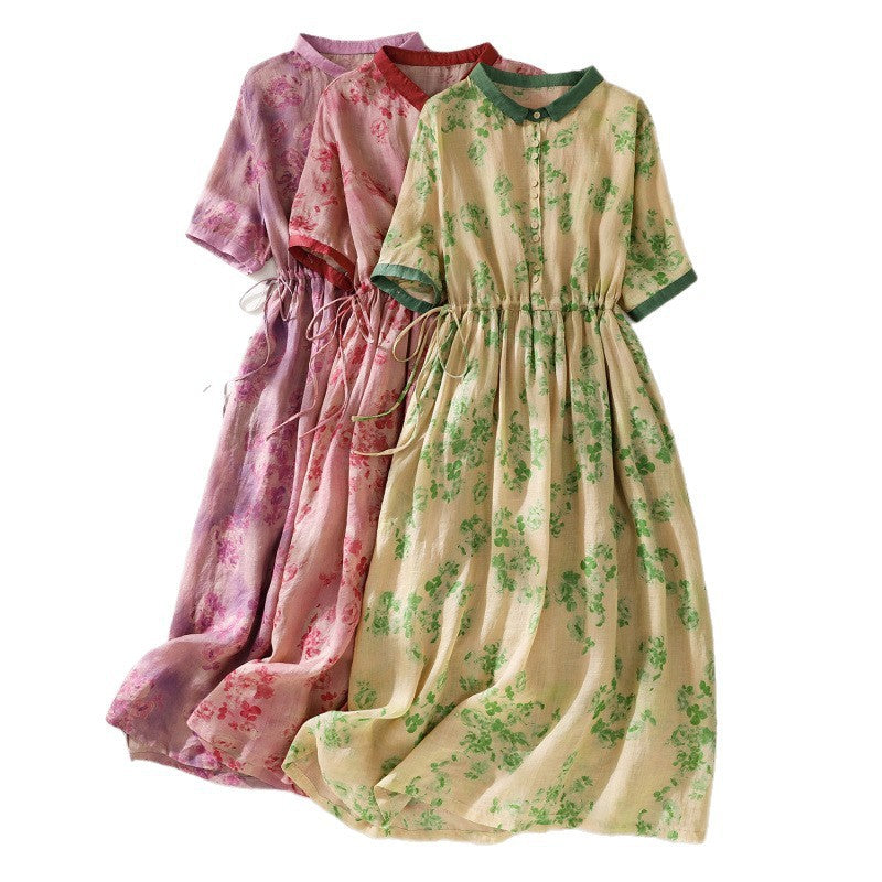 Three floral print cotton midi dresses in red, pink, and green with drawstring waists