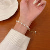Women's Charm Bracelet with Pearls and Charms