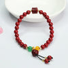 Cinnabar Rose Bracelet with Gold-Tone Accents