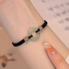 Woven Cord Bracelet with Lotus or Peace Buckle