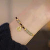 Handwoven Jade Bracelet with Fu Charm