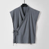 Grey sleeveless cotton linen vest with wrap front and side tie closure