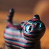 Carved Rainbow Eucalyptus Wood Cat Figurine