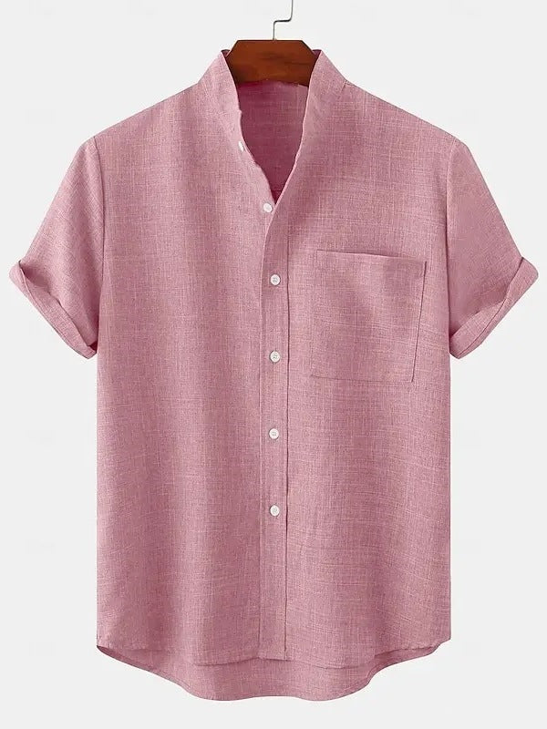 A pink men's linen short sleeve shirt with a collar and buttons