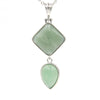 Silver tone geometric pendant necklace with two polished stones in square and teardrop shapes