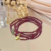 Triple Wrap Garnet Bracelet with Jade and Fu Charm