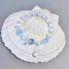 Cat's Eye Glass Bracelet with Star and Moon Charms