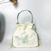 Embroidered Drawstring Bucket Bag with Tassel, Floral and Animal Motifs