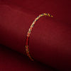 Close up of a handmade five color woven thread bracelet on a red background
