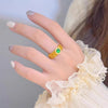 Gold-Tone Filigree Ring with Green Stone