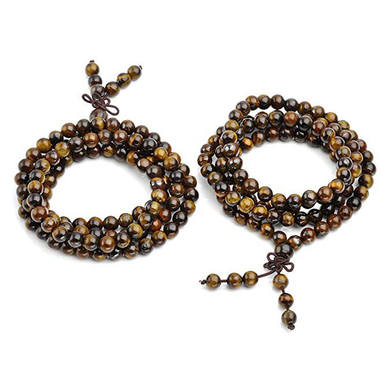 Coiled natural tiger eye gemstone prayer mala with woven knot detail
