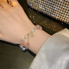 Women's Charm Bracelet with Pearls and Charms