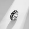 Steel tone rotatable ring with Chinese characters on a white background