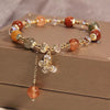 Rutilated Quartz Butterfly and Pixiu Charm Bracelet